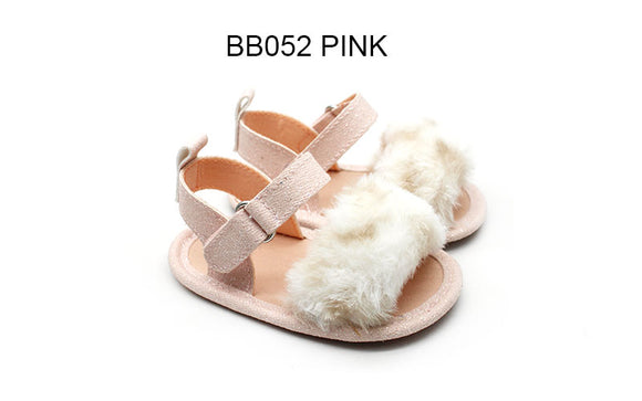 Baby pre-walk sandal embelished with fake fur and glitter canvas .  The fur was passed pulling test . This ideal shoes for protecting your baby girl's feet and also accomplish her first fashion look . 